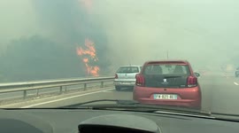 Raging forest fire interrupts drivers with heavy smoke near Marseille, France