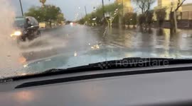 Water floods the roads in Phoenix, Arizona following massive thunderstorm