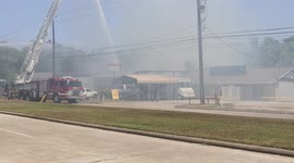 Smokey conditions on the Eastex Freeway were from a large commercial building fire in northeast Houston