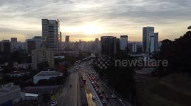 Time lapse of traffic in São Paulo, Brazil with a view of sunrise