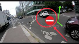 Cars and especially parisian taxis drive illegally in this cycle path every day. Angle Rue Neuve Tolbiac and rue Pau Casals, Paris 13th arrondissement. 1st august 2022.