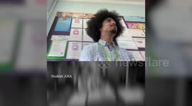 Watch the moment a teacher played his music for his Year 6 class sending them into a rapturous roar of laughter