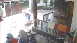 Moment man catches his younger brother who fell from balcony in southern India