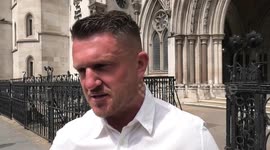 Tommy Robinson speaks outside Royal Courts of Justice after being hit with a fine