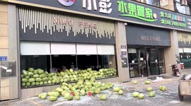 Shop's glass window shatters due to weight of watermelons in China