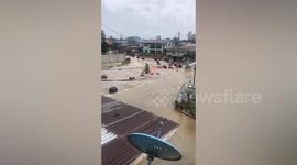 Dozens of clay pots storing cherries washed away by floods in Myanmar