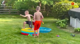 Three brothers fall one after the other while playing in the backyard