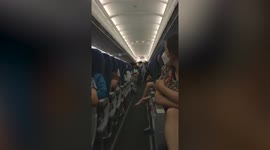 Doctors onboard flight treat passenger who collapsed with high blood pressure
