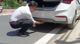 Cat stuck in car's rear bumper rescued in Vietnam