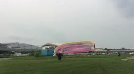 Paramotor takeoff fail - pilot slips and crashes rotor blades on ground