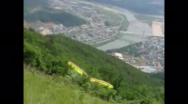 Hang glider take-off fail - crashes into the tree line