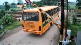 Shocking moment Indian school bus with 40 kids on board gets stuck on rail line as train approaches