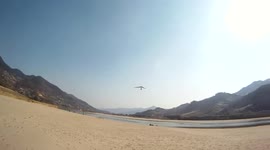 Hang glider landing fail - crashed into beach