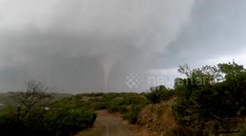 Motorist's dashcam captures large tornado swirling through Texas