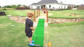 Super dad builds 18-hole mini golf course in his backyard for son's birthday