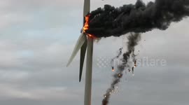 Wind turbine that caught fire spreading thick black smoke across a UK city