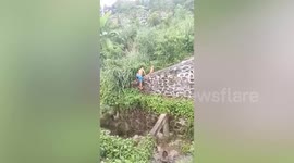 Youngster climbs into dangerous canal to save stranded puppy