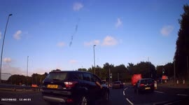 DASHCAM - BAD DRIVING - Driver crosses two lanes to get onto motorway, cutting up and forcing other driver to brake hard.