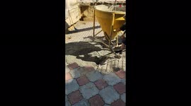 'Worker enjoys pouring concrete on floor in a very unique way'