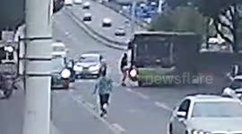 Hero cop jumps onto driverless bus to stop it rolling down road in China
