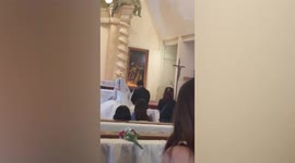Random lady crashes solemn church wedding before being kicked out by security guard