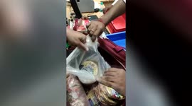 Officials catch passenger at airport carrying foreign currency worth USD 19,428.80 inside spice boxes at airport in northern India