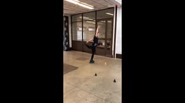 Skater flawlessly performs freestyle slalom sequence at breakneck speed
