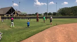 Child Scared by Dinosaur Costume