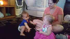 Babies Fight Over Phone