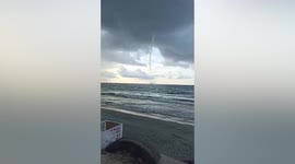 Residents panic as waterspout turns into tornado in the Philippines