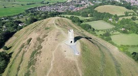 Visitors experience a parched landscape at the Glastonbury Tor