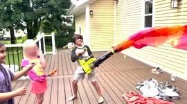Canadian dad builds 'flame thrower' toy for kids out of leaf blower and coloured fabric