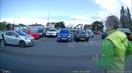 Dashcam captures moment supermarket worker chases after man running from store