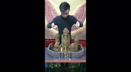 That'll cost a pretty penny! Man uses 90,000 coins to form artwork