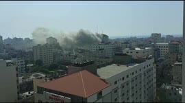 Smoke rises from high-rise Palestine Tower in Gaza City