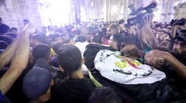 Palestinians attend the funeral of Islamic Jihad commander Tayseer al-Jabari who was killed in an Israeli air strike along with another Palestinians in Gaza City