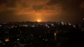 Smoke and flames from Israeli air attacks light up night sky over Gaza City