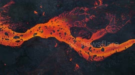 Mesmerizing aerial footage of Iceland volcano shows river of lava