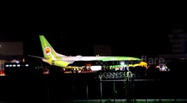 Airport staff battle to remove crashed plane from runway in Thailand