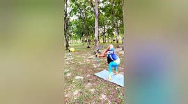 Child prodigy hits target operating bow and arrow with his feet