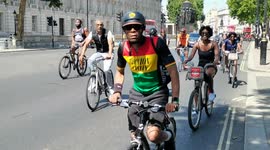 Black Unity Bike Ride passes Downing Street in London