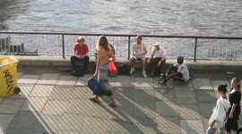 Brave London man struts around Southbank in just a towel