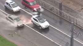 Heavy rain hits St Petersburg, Russia, after a long spell of hot weather