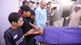 Relatives of killed Islamic Jihad commander Khaled Mansour mourn over his body