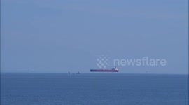 Ship seen 'hovering in sky' in optical illusion off the Kent coast, UK