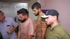 Palestinians mourn over the bodies of Diaa Al-Borai and Ahmed Afana, killed in an Israeli air strike