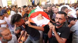 Mourners in Gaza attend the funeral of Palestinians killed in Israeli air strikes