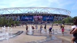 Children enjoy splash fountain in Queen Elizabeth Olympic Park as it celebrates ten years of the London 2012 games