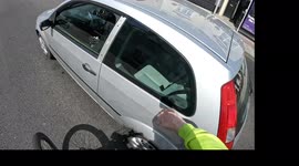 After a close pass car driver goes all road rage and goes for me.