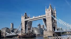 Gotheborg, world's largest wooden sailing ship, passes through Tower Bridge